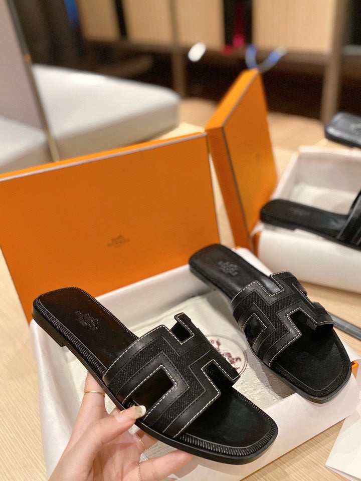 Hermes 0RAN Sandals in Black Calfskin and Canvas