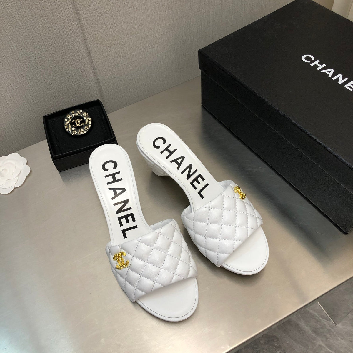 Chanel Diamond-Quilted 6 cm Sandals in White Lambskin