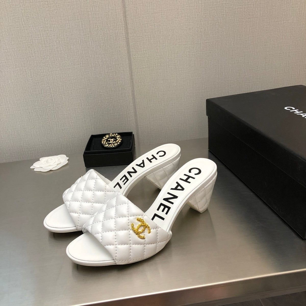 Chanel Diamond-Quilted 6 cm Sandals in White Lambskin