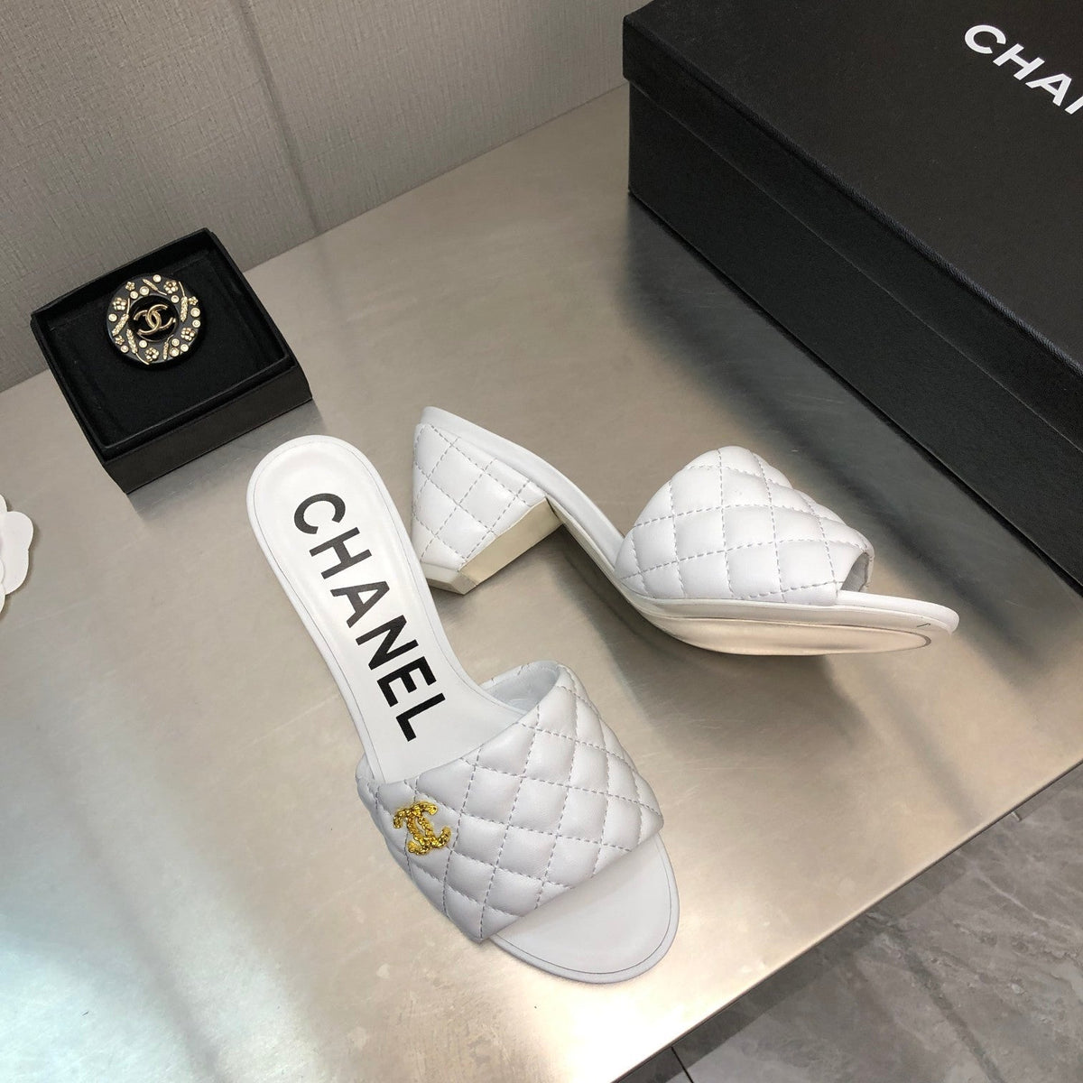 Chanel Diamond-Quilted 6 cm Sandals in White Lambskin