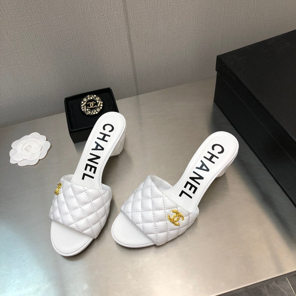 Chanel Diamond-Quilted 6 cm Sandals in White Lambskin