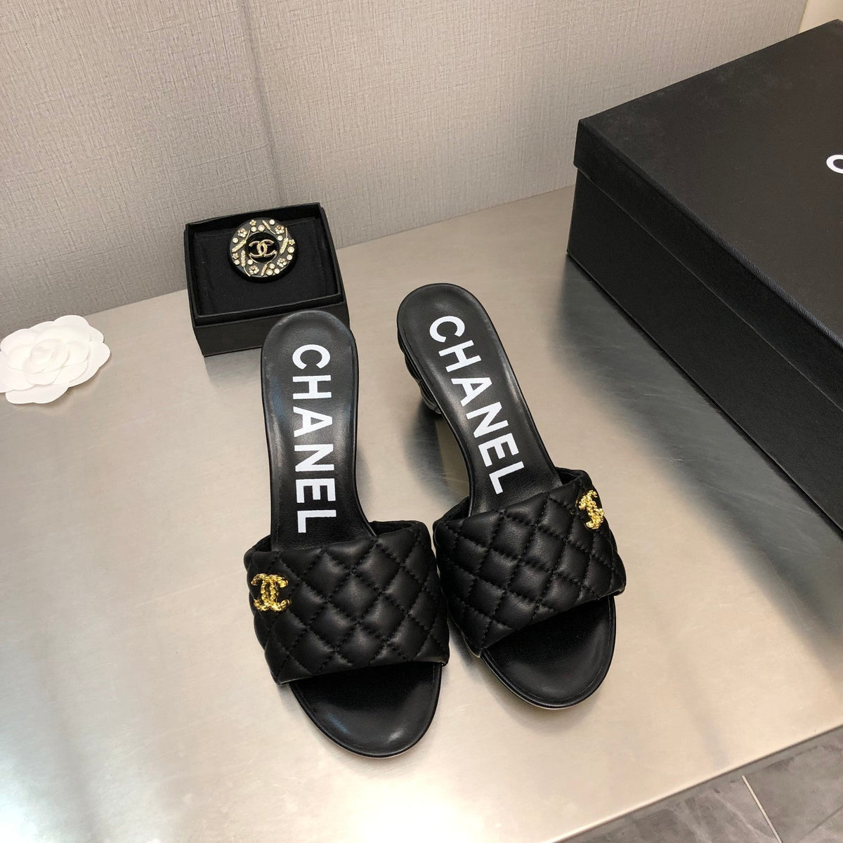 Chanel Diamond-Quilted 6 cm Sandals in Black Lambskin