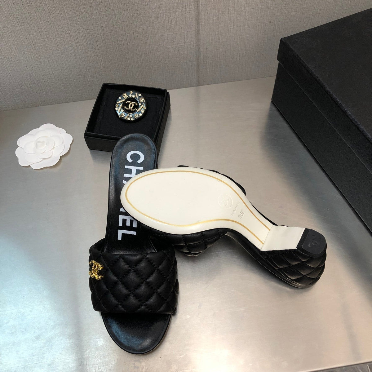Chanel Diamond-Quilted 6 cm Sandals in Black Lambskin