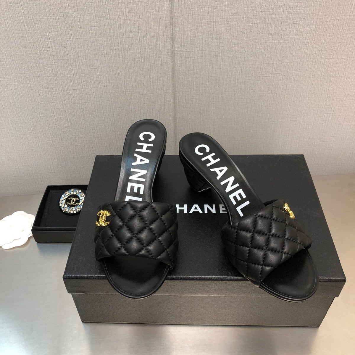 Chanel Diamond-Quilted 6 cm Sandals in Black Lambskin