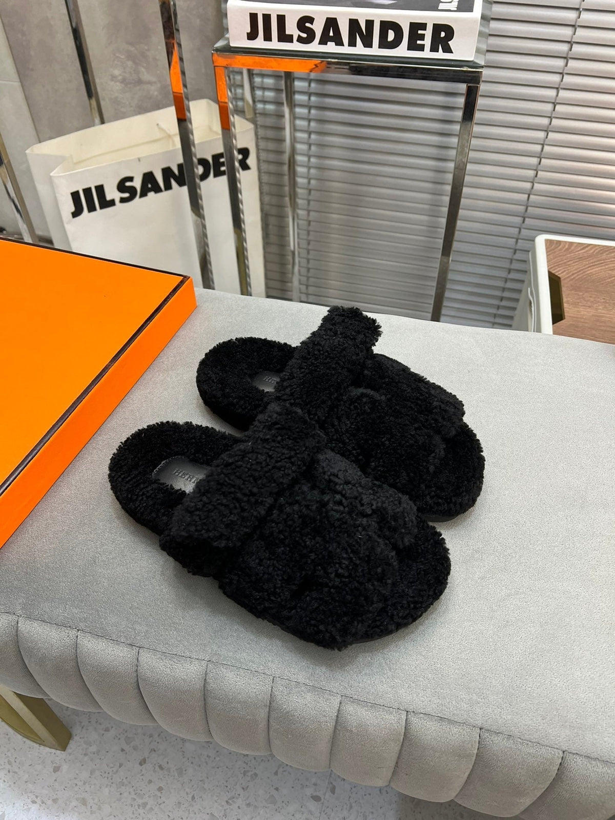 Hermes Chypre Slippers in Black Lamb Wool