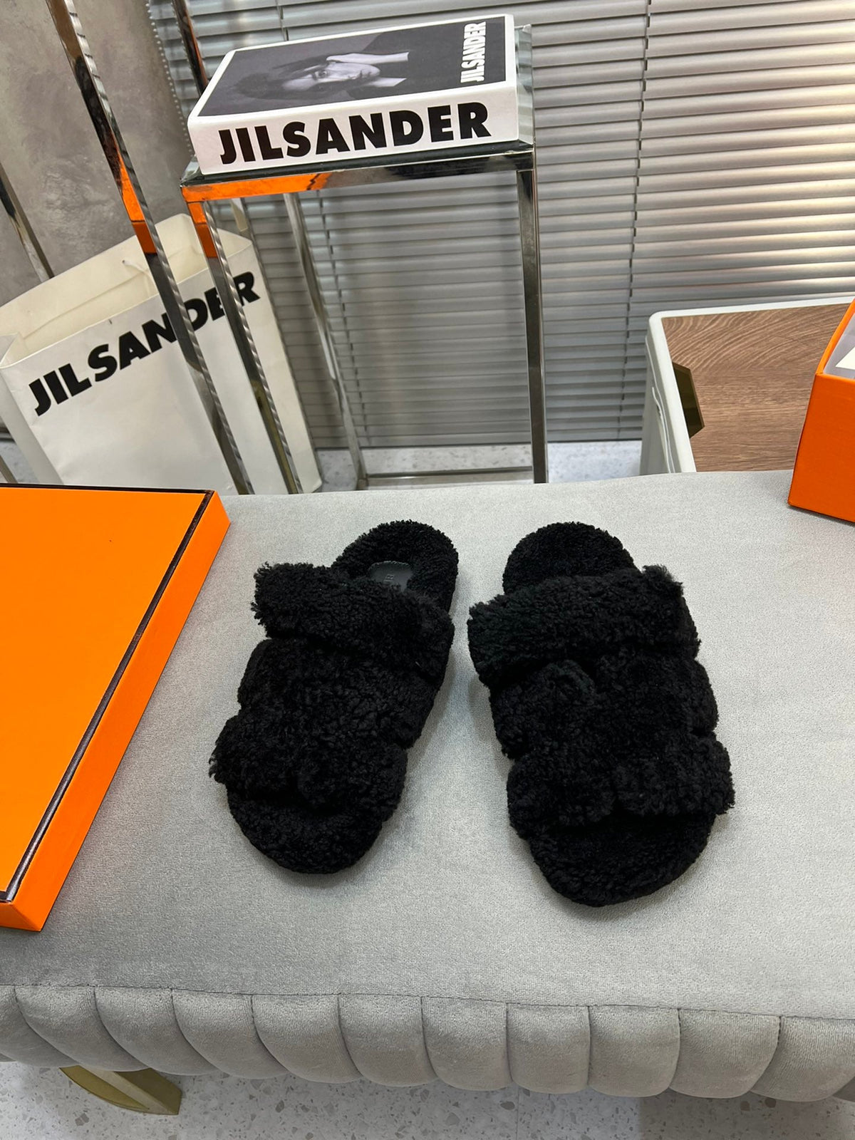 Hermes Chypre Slippers in Black Lamb Wool
