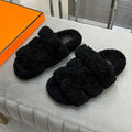 Hermes Chypre Slippers in Black Lamb Wool
