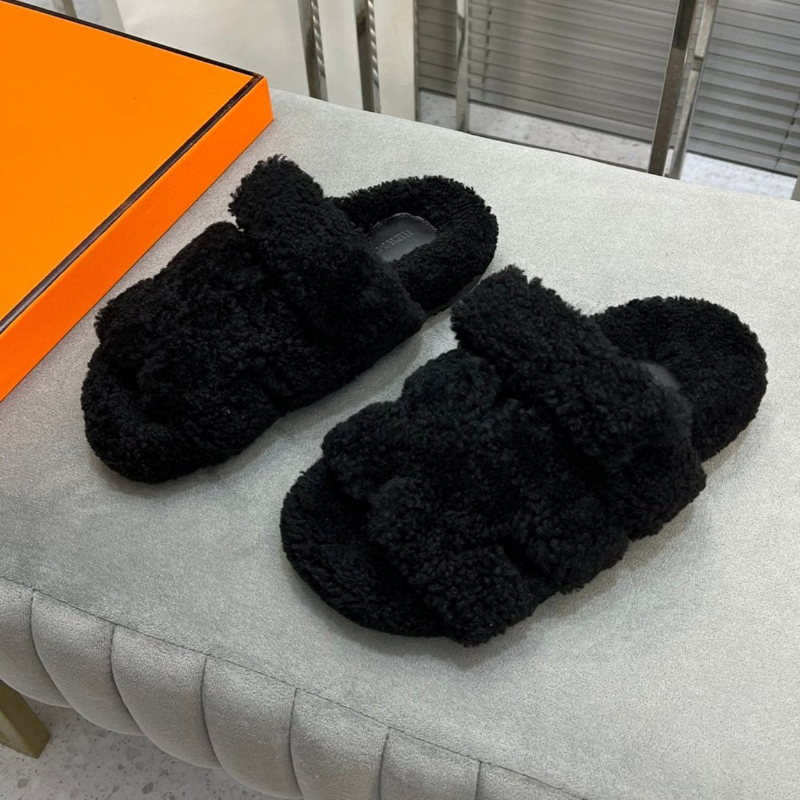 Hermes Chypre Slippers in Black Lamb Wool