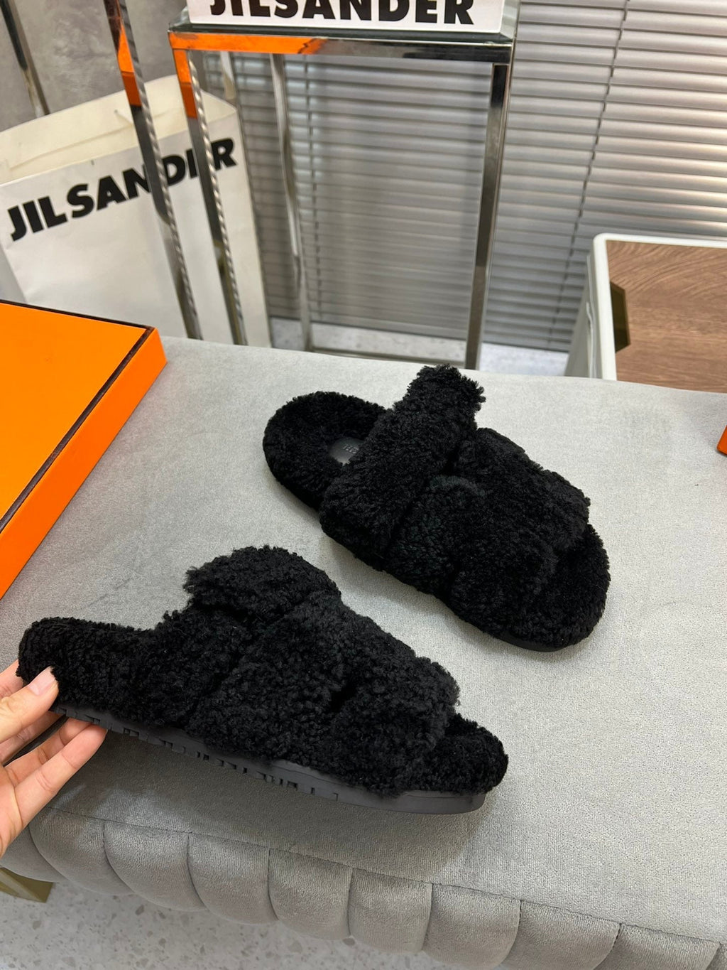 Hermes Chypre Slippers in Black Lamb Wool