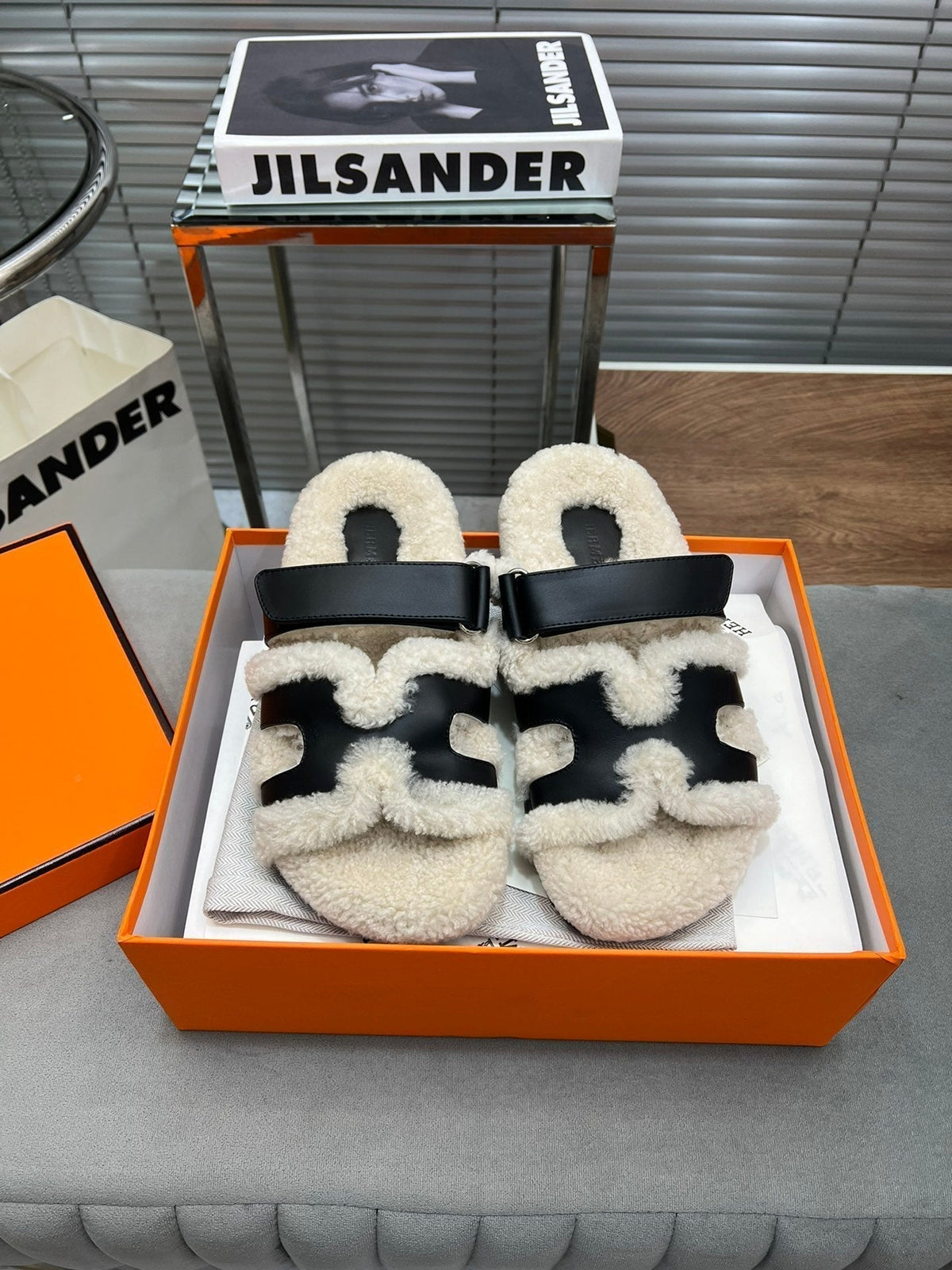Hermes Chypre Slippers in Beige Lamb Wool and Black Calfskin