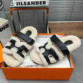 Hermes Chypre Slippers in Beige Lamb Wool and Black Calfskin