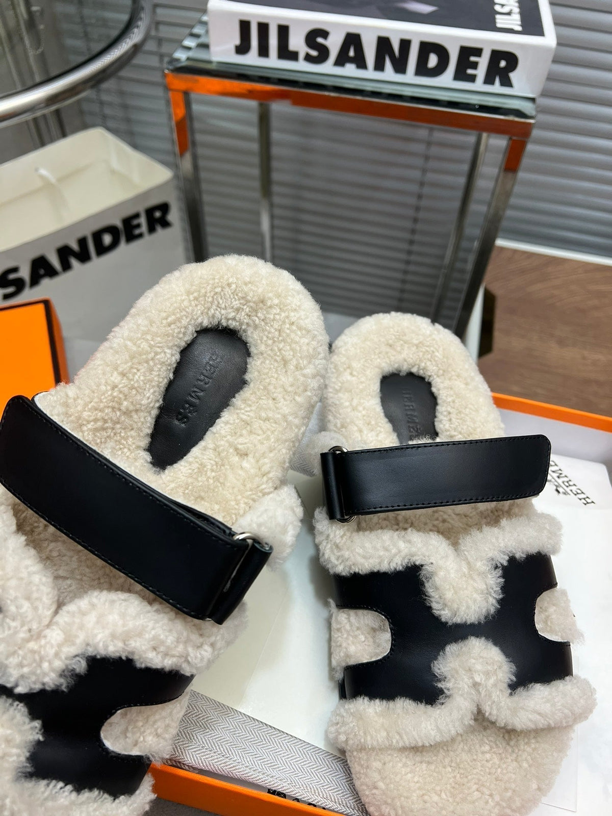 Hermes Chypre Slippers in Beige Lamb Wool and Black Calfskin