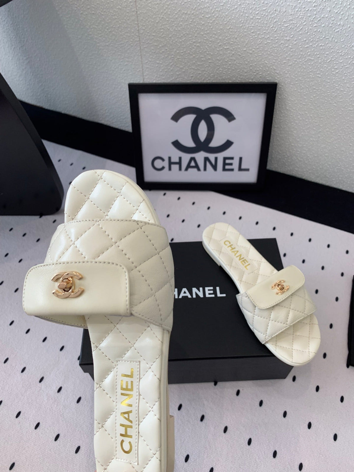 Chanel Slippers in White Calfskin