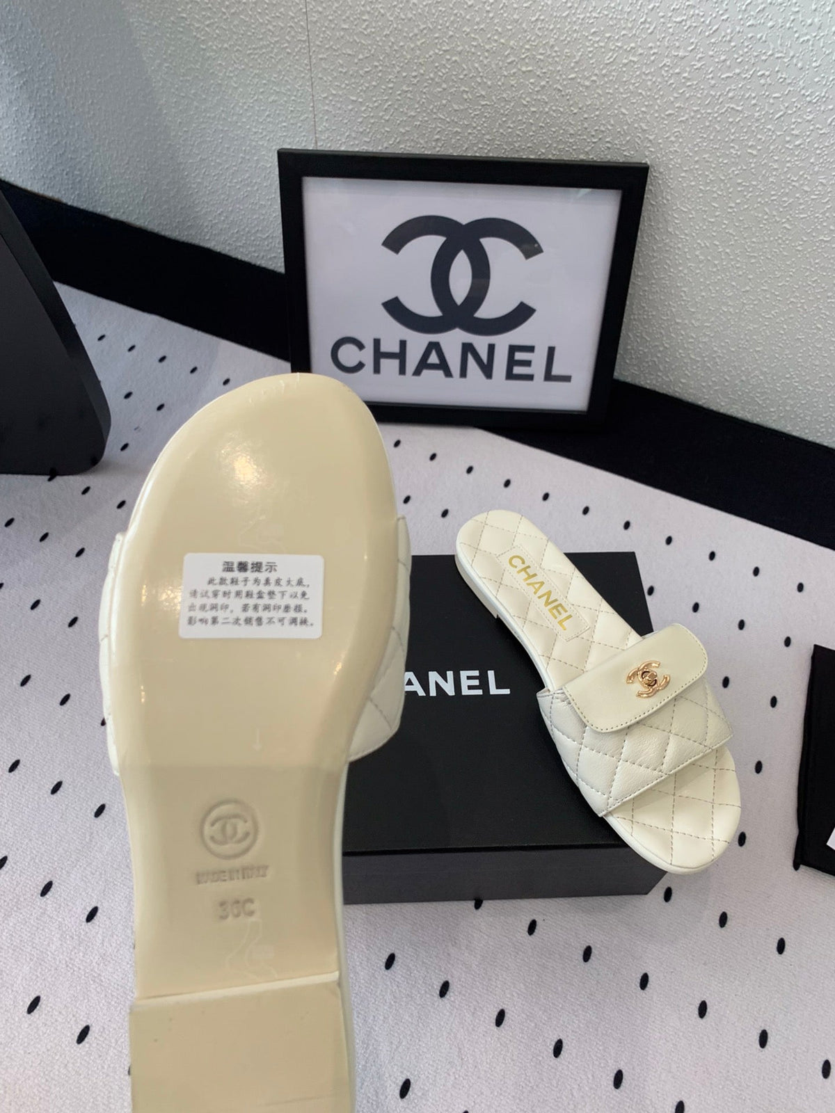 Chanel Slippers in White Calfskin