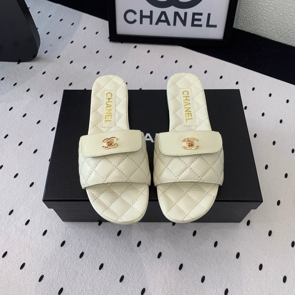 Chanel Slippers in White Calfskin