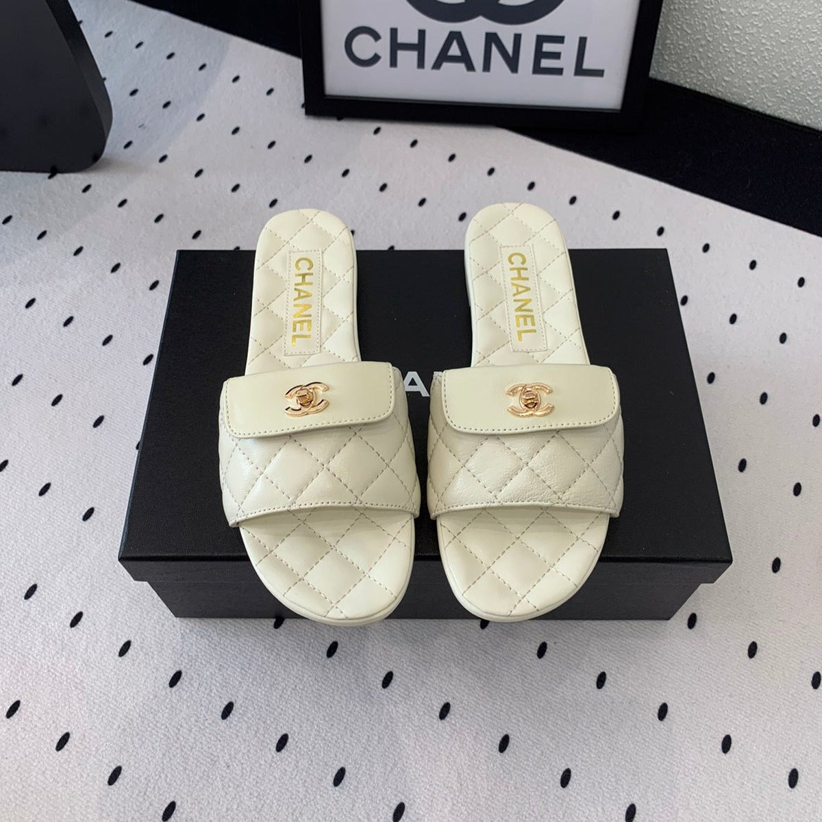 Chanel Slippers in White Calfskin