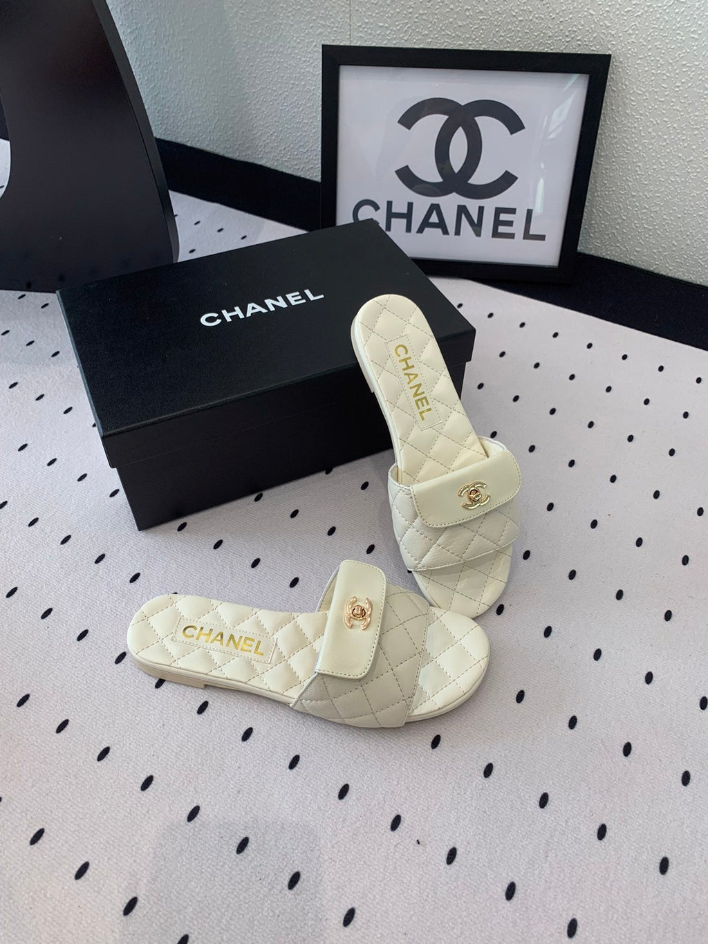 Chanel Slippers in White Calfskin