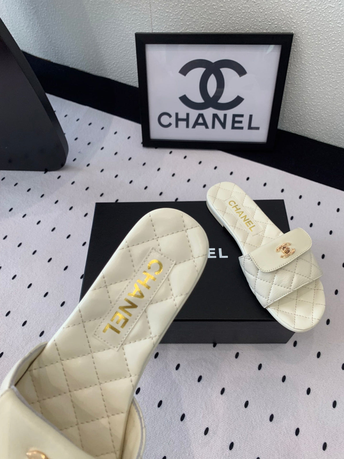 Chanel Slippers in White Calfskin