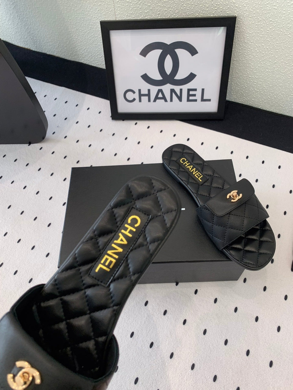 Chanel Slippers in Black Calfskin