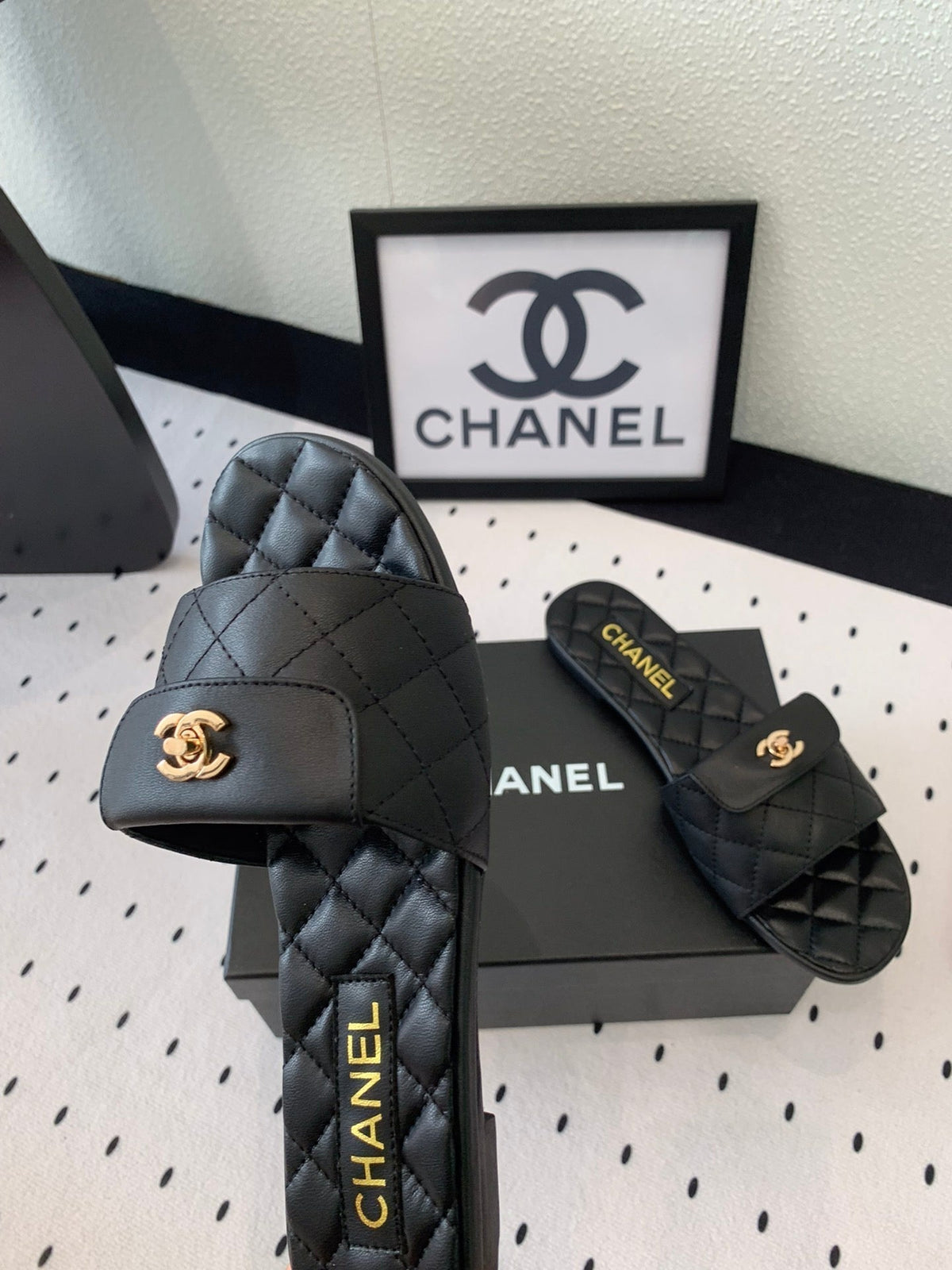 Chanel Slippers in Black Calfskin