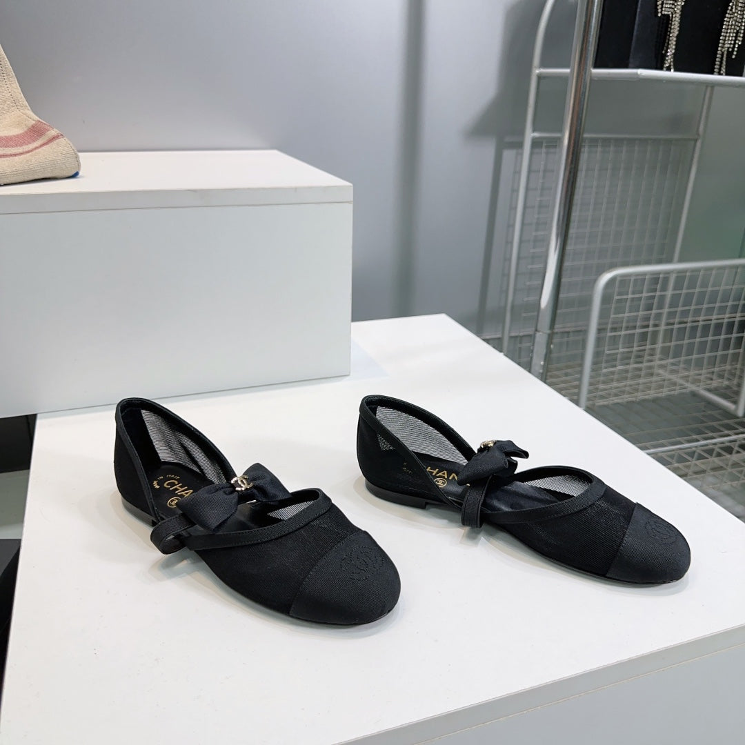 Chanel Flat Mary Jane Shoes 25S in Black Mesh Fabric Embossed Logo with Bow