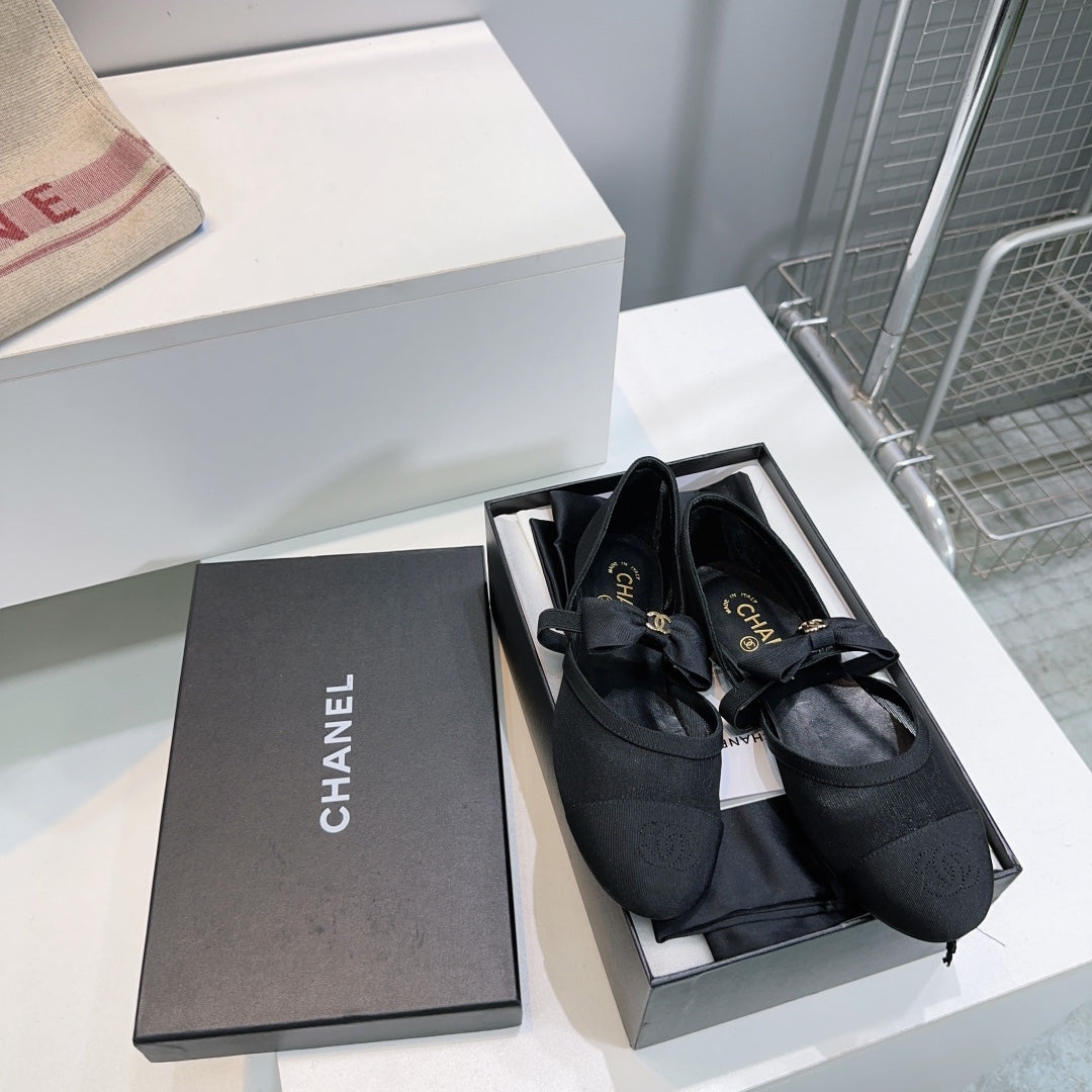 Chanel Flat Mary Jane Shoes 25S in Black Mesh Fabric Embossed Logo with Bow