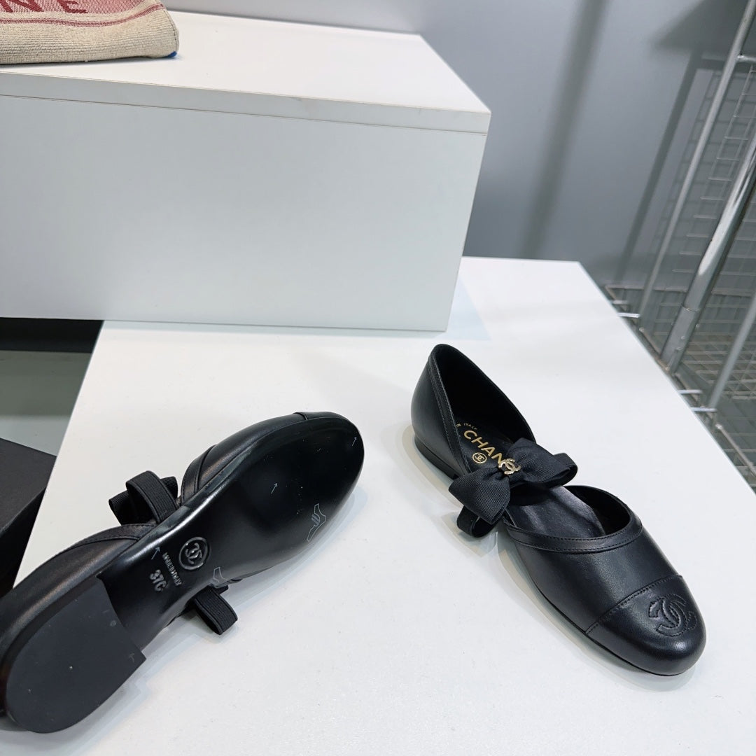 Chanel Flat Mary Jane Shoes 25S in Black Lambskin Embossed Logo with Bow