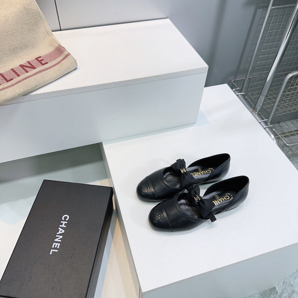 Chanel Flat Mary Jane Shoes 25S in Black Lambskin Embossed Logo with Bow