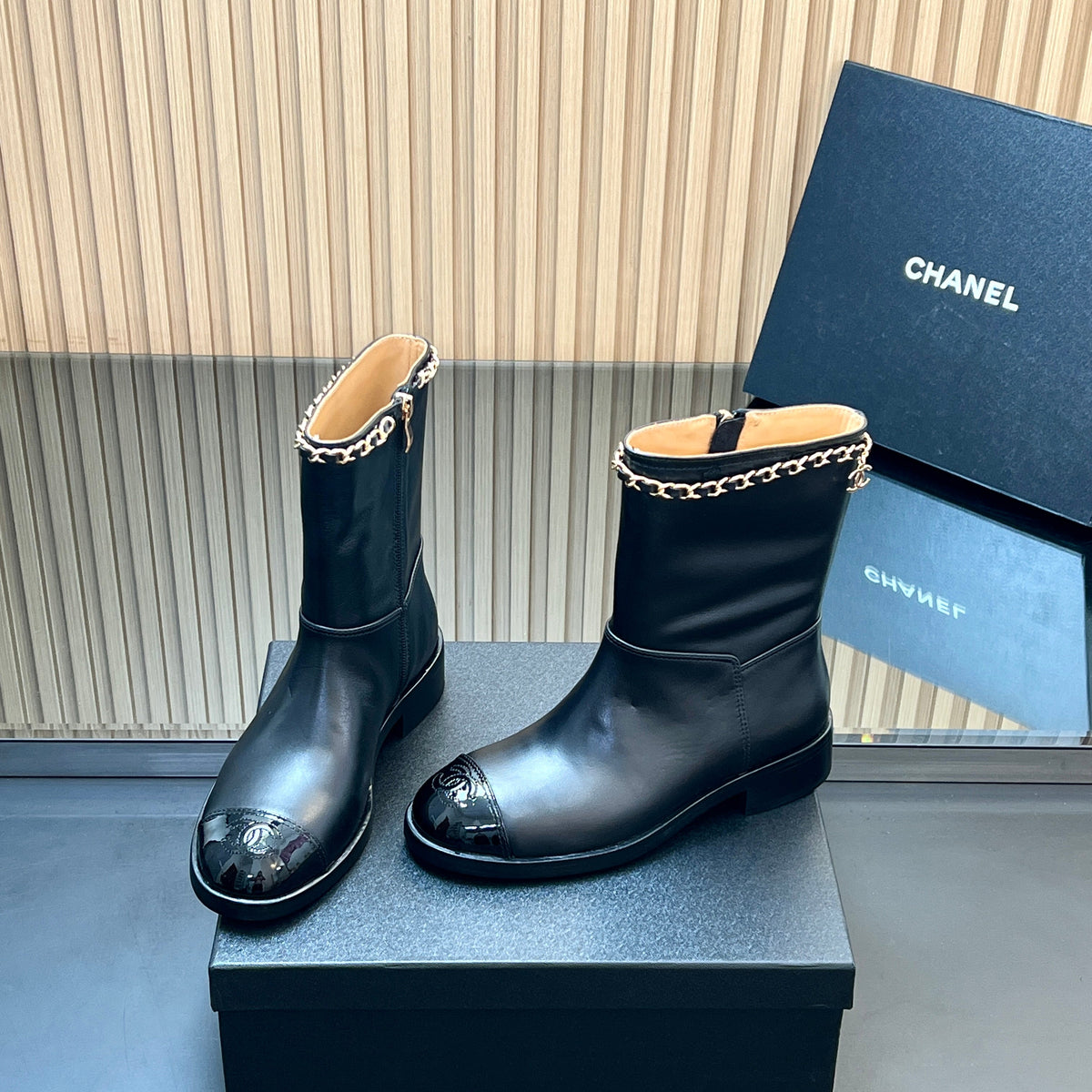 Chanel 25S Short Boots with Chain in Black Calfskin