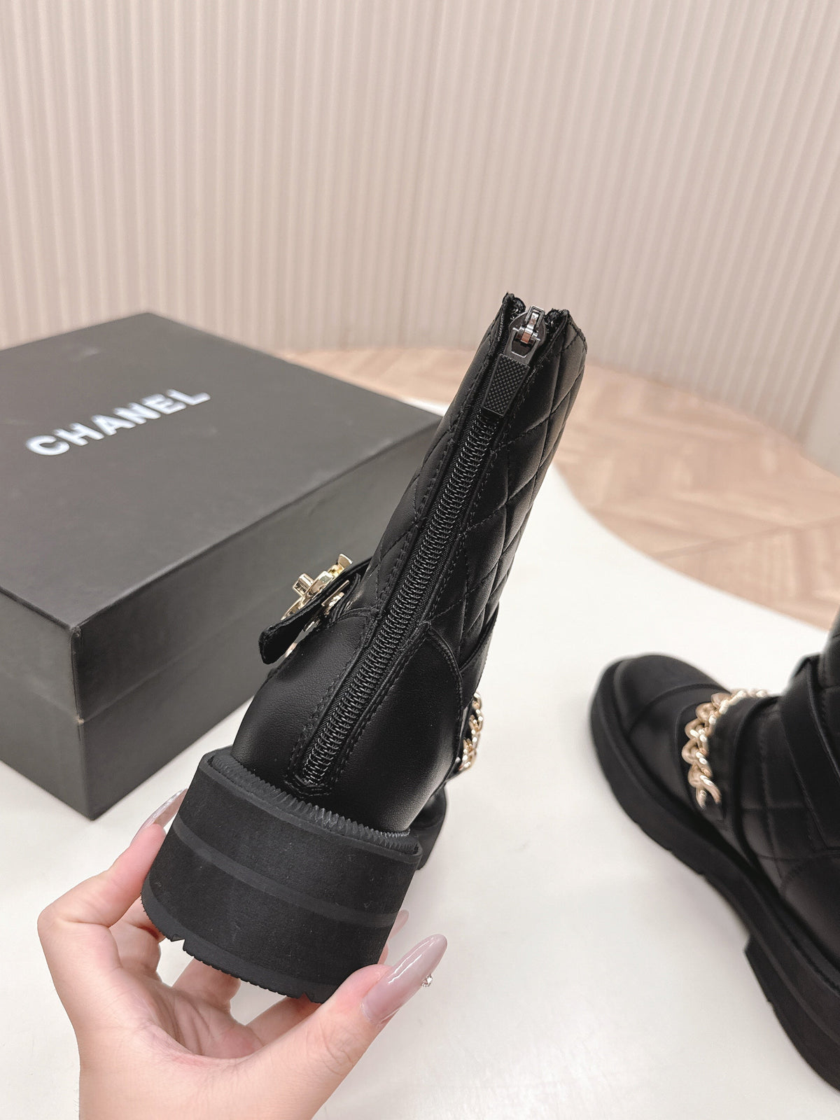 Chanel Ankle Boots 25S in Black Lambskin Embossed Logo with Gold Hardware