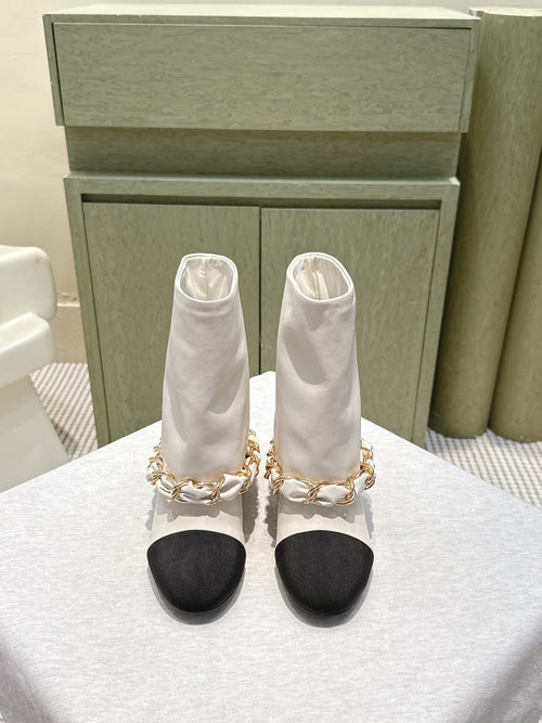 Chanel 25S Calf-Length Boots 45mm in White and Black Calfskin Gold Hardware