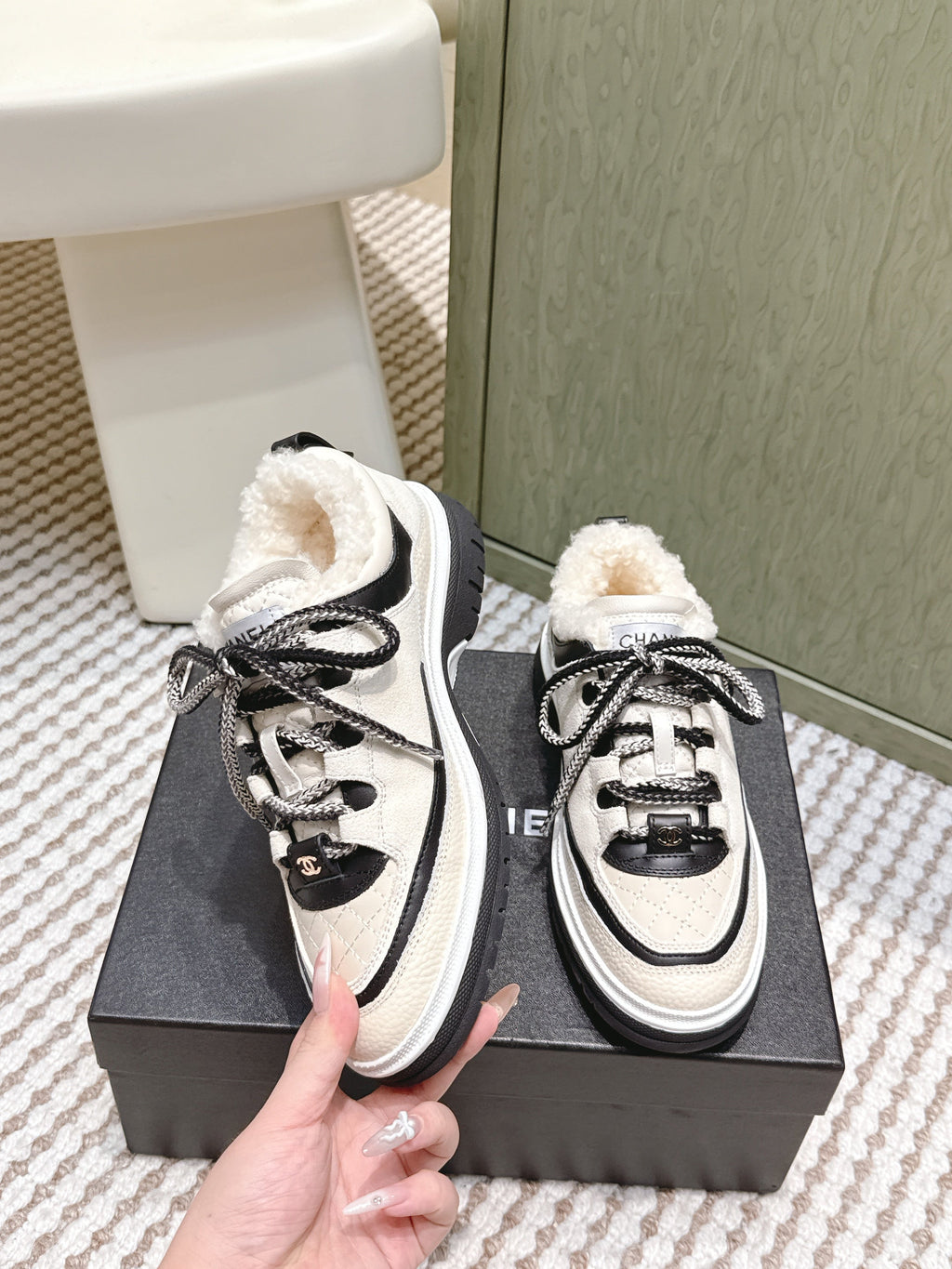 Chanel 25S Thick-Sole Sneakers in White and Black Calfskin with Fur Lining