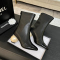 Chanel Pearl Boots 65mm in Black Calfskin