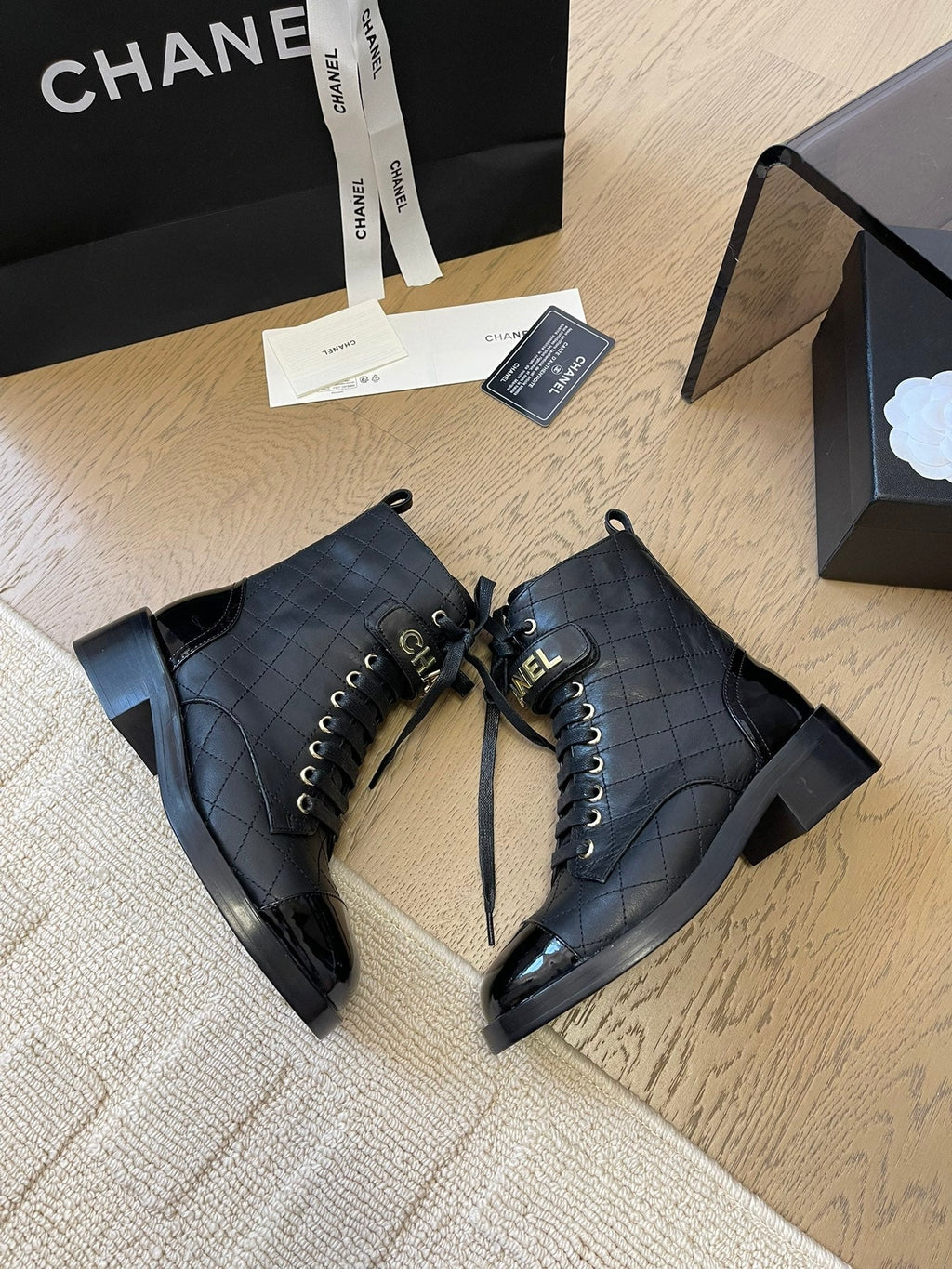 Chanel Alphabet Martin Boots in Black Lambskin