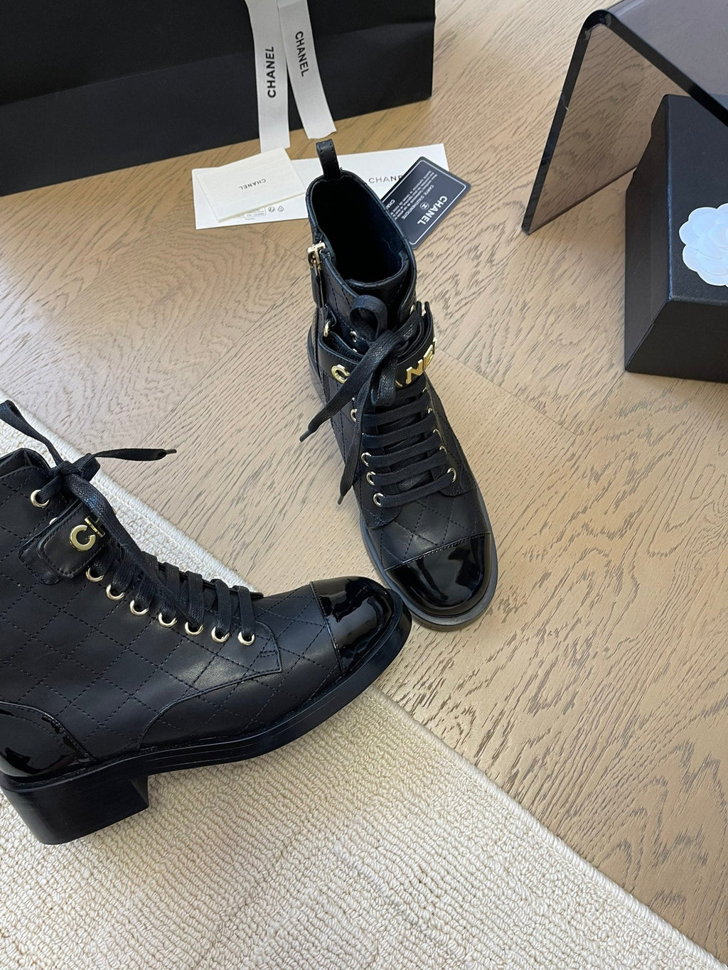 Chanel Alphabet Martin Boots in Black Lambskin