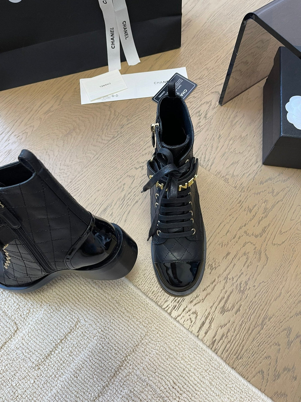 Chanel Alphabet Martin Boots in Black Lambskin