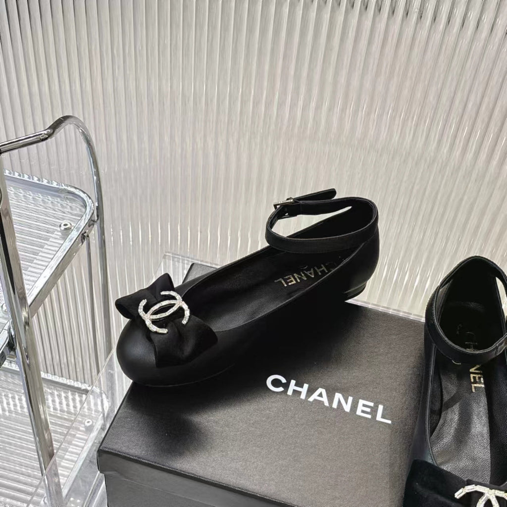 Chanel Bow Mary Jane Shoes in Black Lambskin