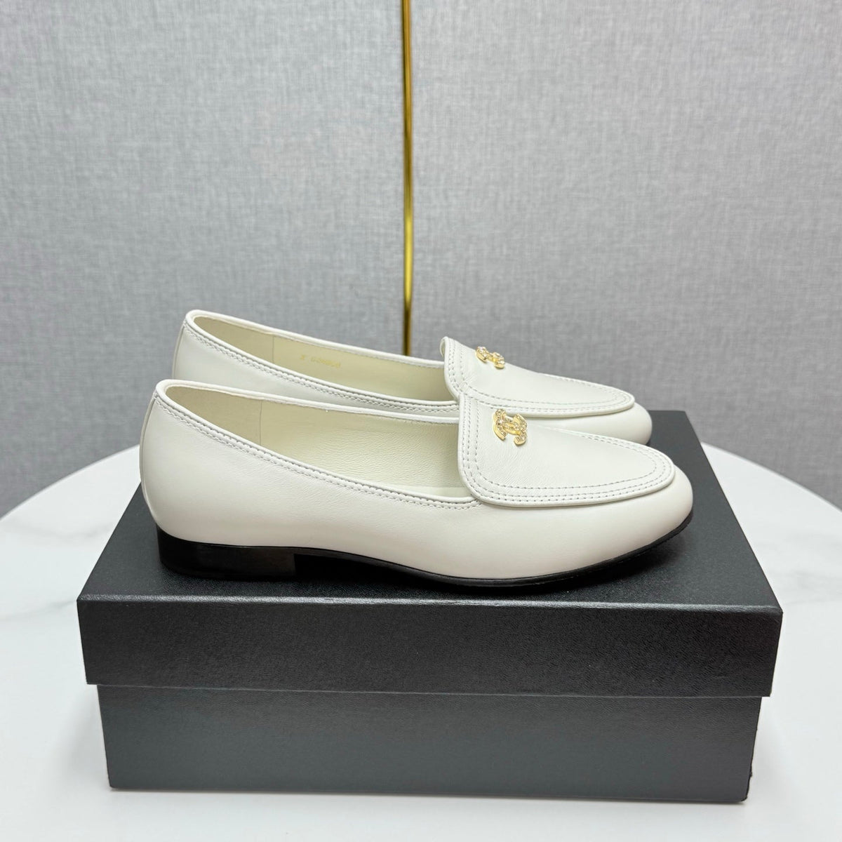 Chanel Loafers 25S in White Calfskin Gold Hardware with Stones