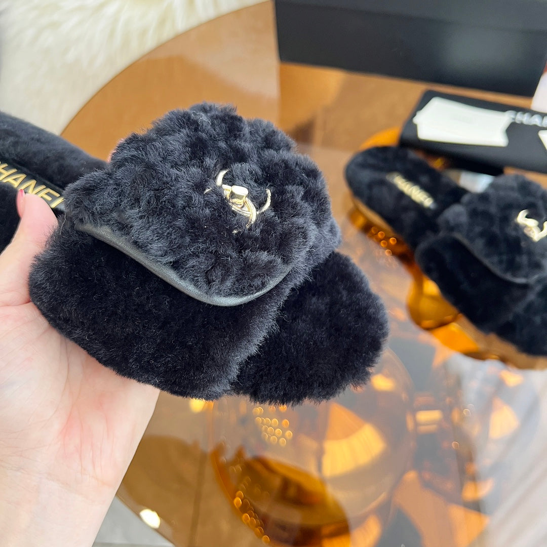 Chanel 25S Fur Slippers in Black Logo Gold Hardwre