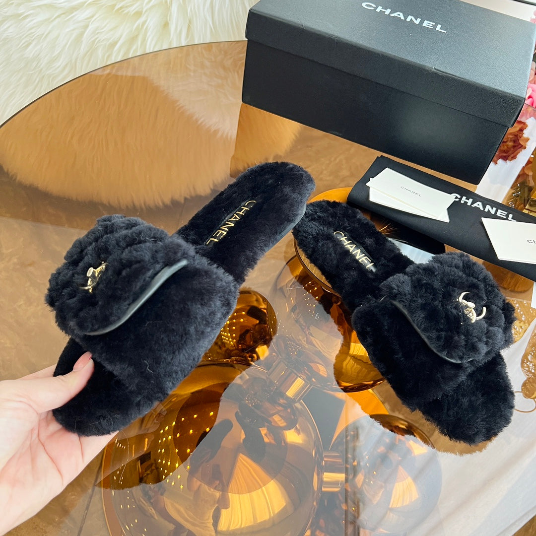 Chanel 25S Fur Slippers in Black Logo Gold Hardwre