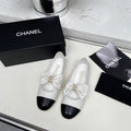 Chanel 25S Mary Janes in White Mix Black Calfskin with Bow Gold Hardware