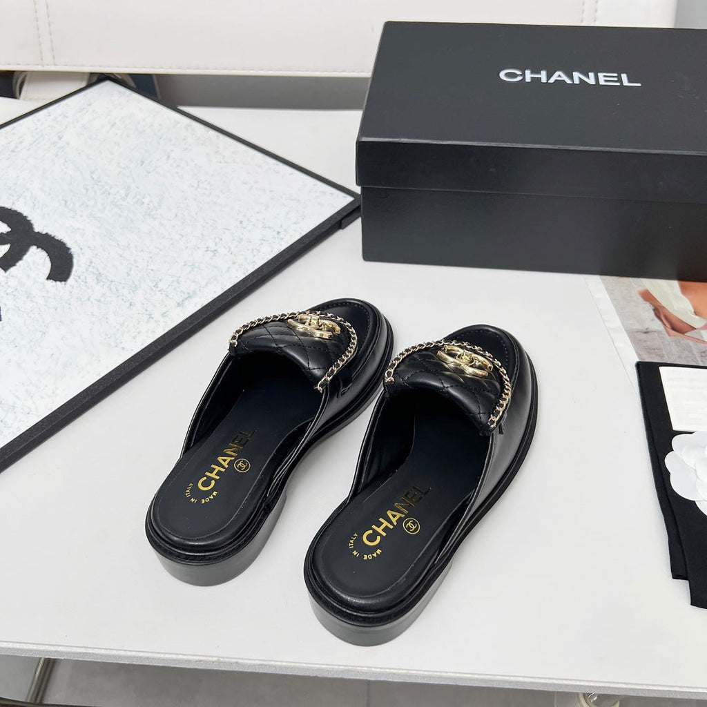 Chanel 25S Mules with Chain Detail in Black Calfskin Gold Hardwre
