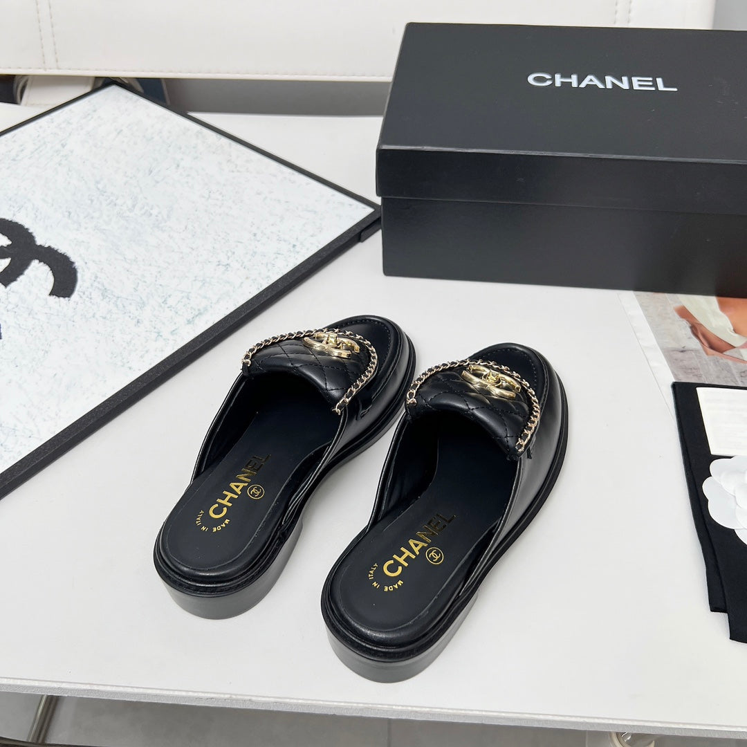 Chanel 25S Mules with Chain Detail in Black Calfskin Gold Hardwre