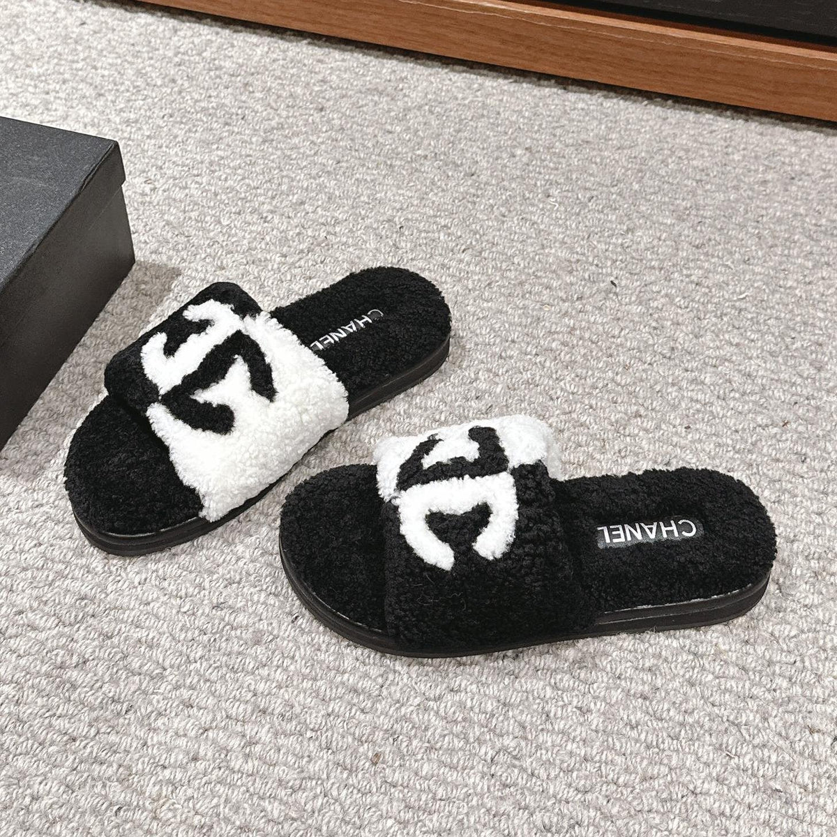 Chanel Slippers in Black Mix White Fleece