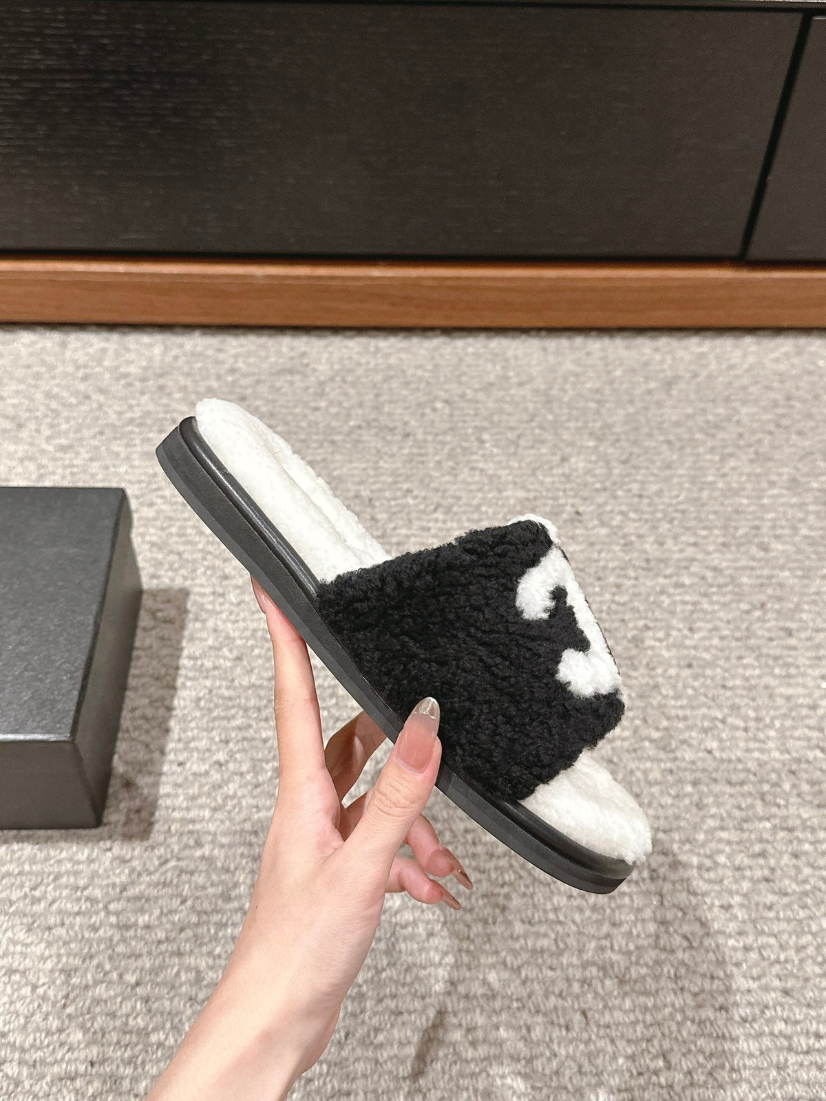 Chanel Slippers in White Mix Black Fleece