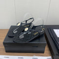 Chanel Thong Sandal in Black Lambskin with Pearl Flower