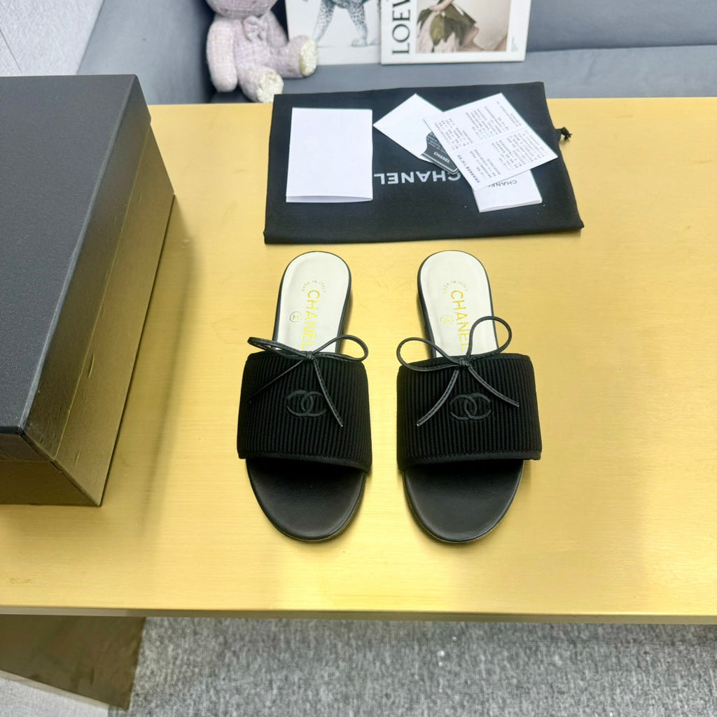 Chanel Bow Slippers in Black Lambskin