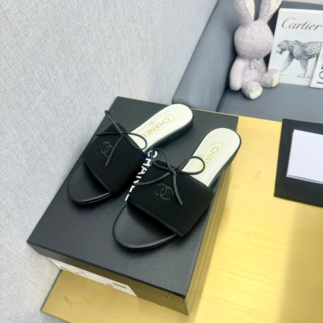 Chanel Bow Slippers in Black Lambskin