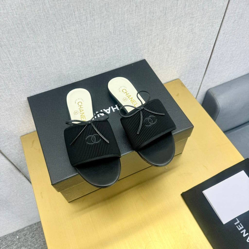 Chanel Bow Slippers in Black Lambskin