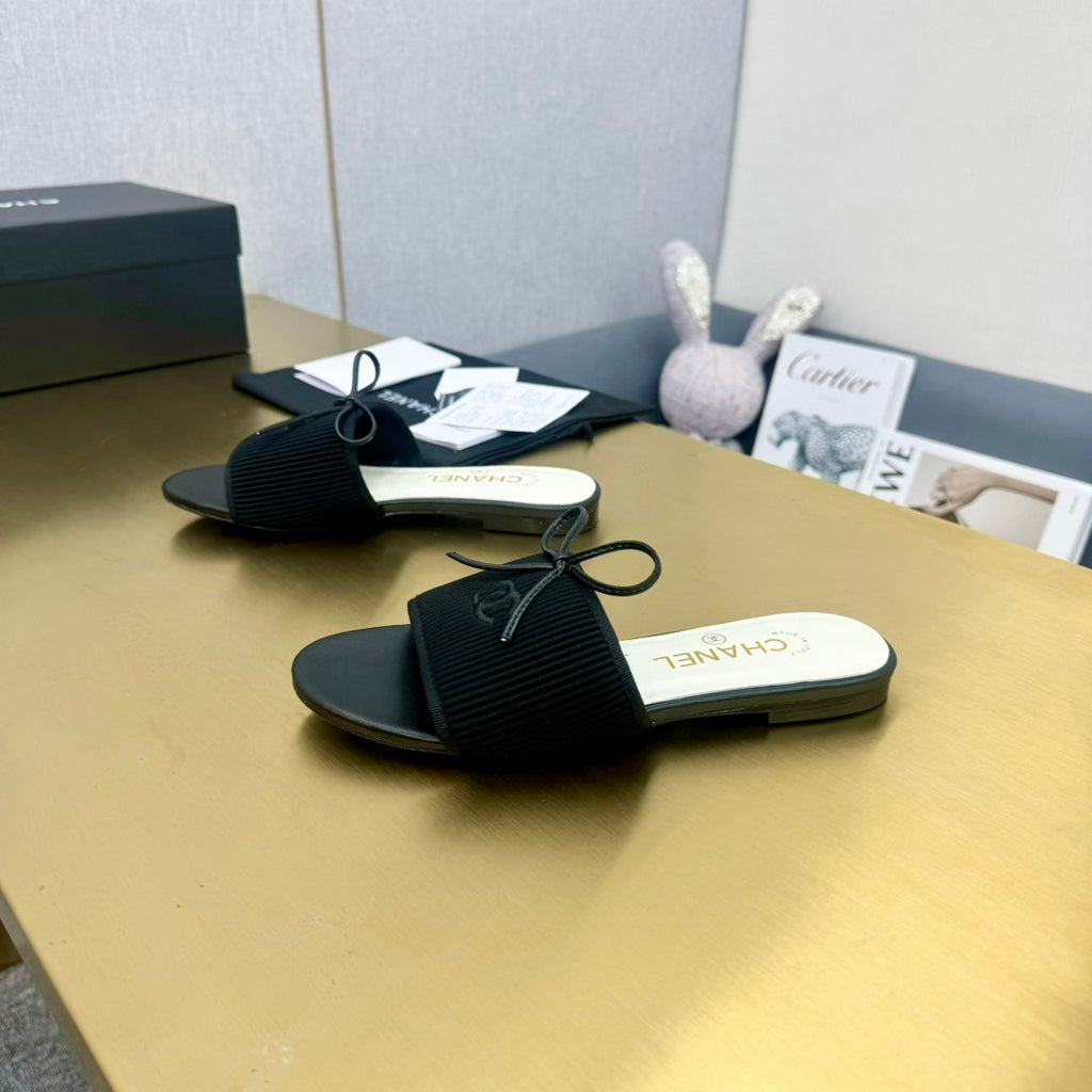 Chanel Bow Slippers in Black Lambskin